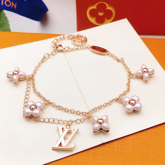 ¡®Aura Jewels¡¯LOGO 6 MOTIF STAR AND SUN GOLD BRACELET